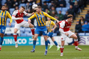 Josh Vela of Shrewsbury Town and Callum Camps of Fleetwood Town (AMA)
