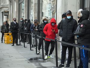 Supporting image for story: Early morning queues as thousands of non-essential shops reopen in England