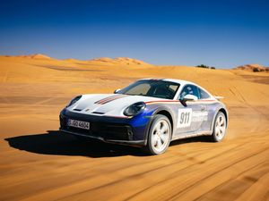 Supporting image for story: First Drive: The Porsche 911 Dakar is an off-road marvel