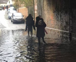 Daniel Dovaston helped a grandmother and her grandson through floodwater