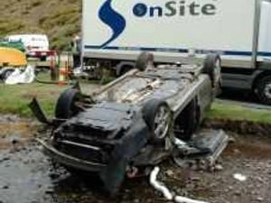 Supporting image for story: Woman dies after smash on hillside