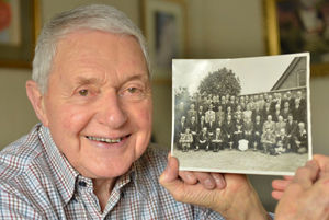 David Barnett with a picture of the Newport Male Voice choir during the early years