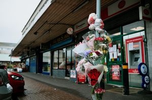 Floral tributes left at West Cross Shopping Centre in Smethwick