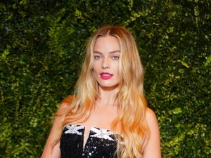 Supporting image for story: In Pictures: Margot Robbie stuns at Bafta pre-party in glitzy black dress
