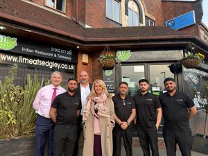 Sir Phillip Davies, Bill Etheridge and MP Esther McVey with staff from Lime Restaurant, Sedgley