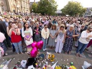 Supporting image for story: Tributes paid to girls who died in Southport attack as hundreds attend vigil
