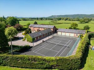 Supporting image for story: For sale: 'Beautifully presented' barn conversion with swimming pool, snooker room, gym, tennis court and annexe