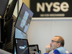 A man looking at computers on the options floor at the New York Stock Exchange in New York