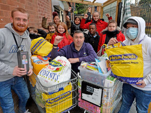 Supporting image for story: Feed a family: Students donate two full minibus loads of items