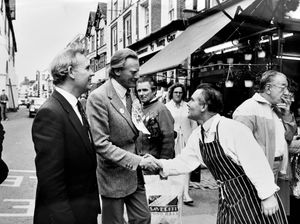 June 1987: Michael Heseltine (later Lord Heseltine) campaigning in Bridgnorth. The caption reads: 'Mr Heseltine has a word with Bridgnorth fishmonger Mr Barry Irving as Mr Gill looks on.' Christopher Gill (on the left) was the Conservative candidate for Ludlow.