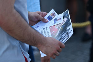 A mourner holding a service sheet at the wake of Diogo Jota being held at Sao Cosme Chapel in the town of Gondomar near Porto