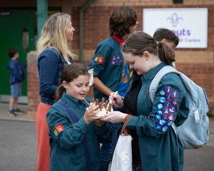 Chloe and Emily sharing an ice cream at the fayre.