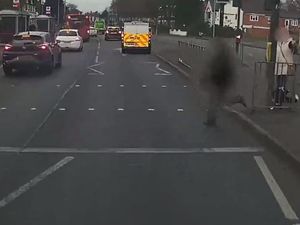 Supporting image for story: Scary footage shows moment pedestrian runs out into road as fire engine approaches