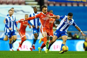 Morsy is seen here playing for Wigan against Shrewsbury last season