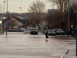 Supporting image for story: Floods misery hits rush hour traffic