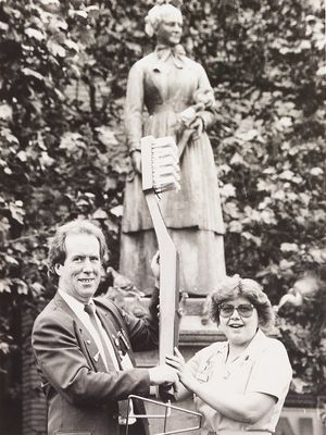 In 1993, Martin Ashcroft was using a standard household toothbrush to clean Walsall's Sister Dora Statue, to raise money for vital medical equipment for Walsall Manor Hospital. The photograph shows Martin holding a giant toothbrush with Karen Widdowson.