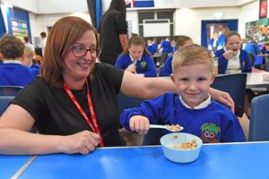 Pupils were able to get a bite to eat with the new national free breakfast program at Landywood school, Great Wyrley. Helen Lloyd with Arlo Potter.
