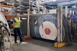 Curator Ewen Cameron at the RAF Museum's storage facility at MOD Stafford. Ewen is with some wings from a DH10, in rare original condition