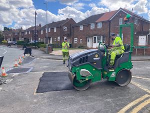 Sandwell Council highways crews fill in the pothole in Barncroft Road, Tividale. Pic: LDRS. Permission for reuse for all LDRS partners.