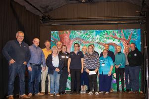 The charities with Chairman David Wilkes to the left.
