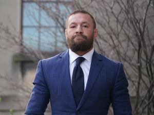 Conor McGregor in blue suit