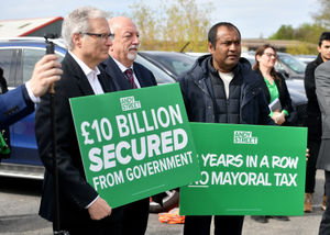Supporters carried slogans with Mr Street's achievements