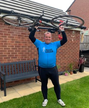 Dave Prince completing his 200-mile cycling challenge in aid of Prostate Cancer UK.