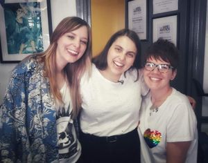 Shop workers Becky and Sarah with Beanie (centre)
