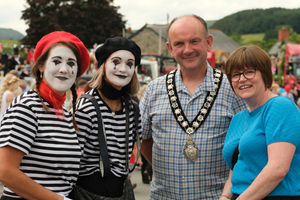 Two members of the Paris float joined Rhayader Mayor Councillor Christian Walton and his wife Hayley for a picture at the carnival. Image by Andy Compton