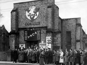 Supporting image for story: The queue snakes outside the Percy Thomas Hall of Wolverhampton youngsters who had fallen prey to a new “cult.”