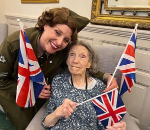 WW2 entertainer, Kerry Young, with a resident at Stretton Hall