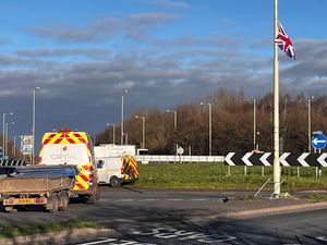 Supporting image for story: 'Intimidating atmosphere': Witness reports 'masked men' hanging up England and UK flags late at night on Christmas Eve as another 90 go up in Shrewsbury