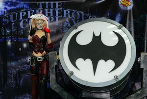 Harley Quinn next to the Bat signal. Photo: Stewart Writtle