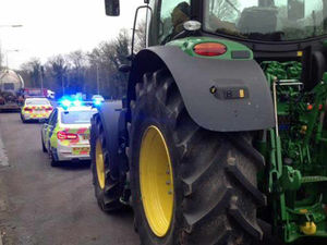 Supporting image for story: Tractor pulled over by police driving down the M54