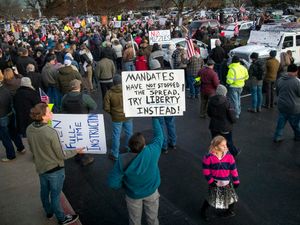 Supporting image for story: Tensions rise over masks as virus grips smaller US cities