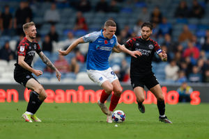 Luke Leahy of Shrewsbury Town and Colby Bishop of Portsmouth (AMA)