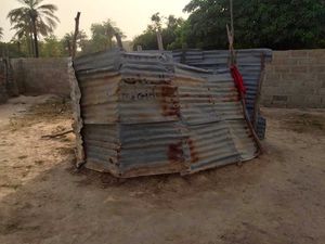 The original toilets for more than 400 children at Ba Ebrima Saidy School in Sanyang.