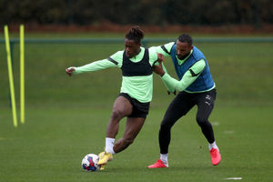 Brandon Thomas-Asante holds off Kyle Bartley (Photo by Adam Fradgley/West Bromwich Albion FC via Getty Images).