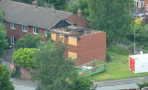 The fire-damaged house has since been demolished