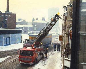 Firefigthers knock the icicles from buildings in Shrewsbury