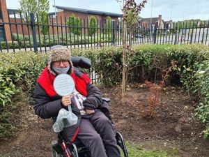 Supporting image for story: Telford care home resident completes 100 laps in wheelchair for blossom tree project