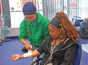Supporting image for story: Volunteers on a mission to teach vital 'street first aid' to young people