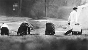 Police search the scene close to where Janine's body was found