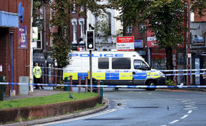 Police at the scene of the killing in October last year