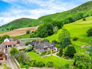 Supporting image for story: Stunning country manor with large grounds, views of the Long Mynd and indoor swimming pool is listed for sale