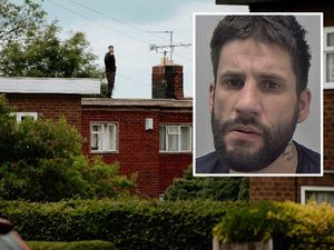 Supporting image for story: Telford man still on the run after rooftop standoff