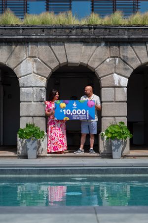 Sandra celebrates with her fiancee, John