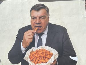 Supporting image for story: Mystery artwork of former England boss eating chips appears in Dudley town centre