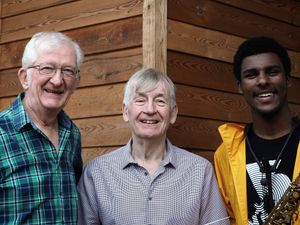 Xhosa Cole (saxophone) with the RSCO’s conductor Bob Vivian and oboist Richard Reakes. 