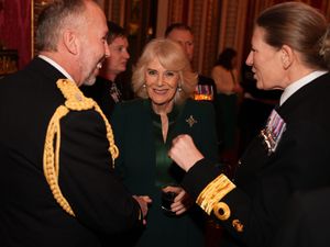 Supporting image for story: Submariners recall Queen delivering them tea and biscuits at palace reception